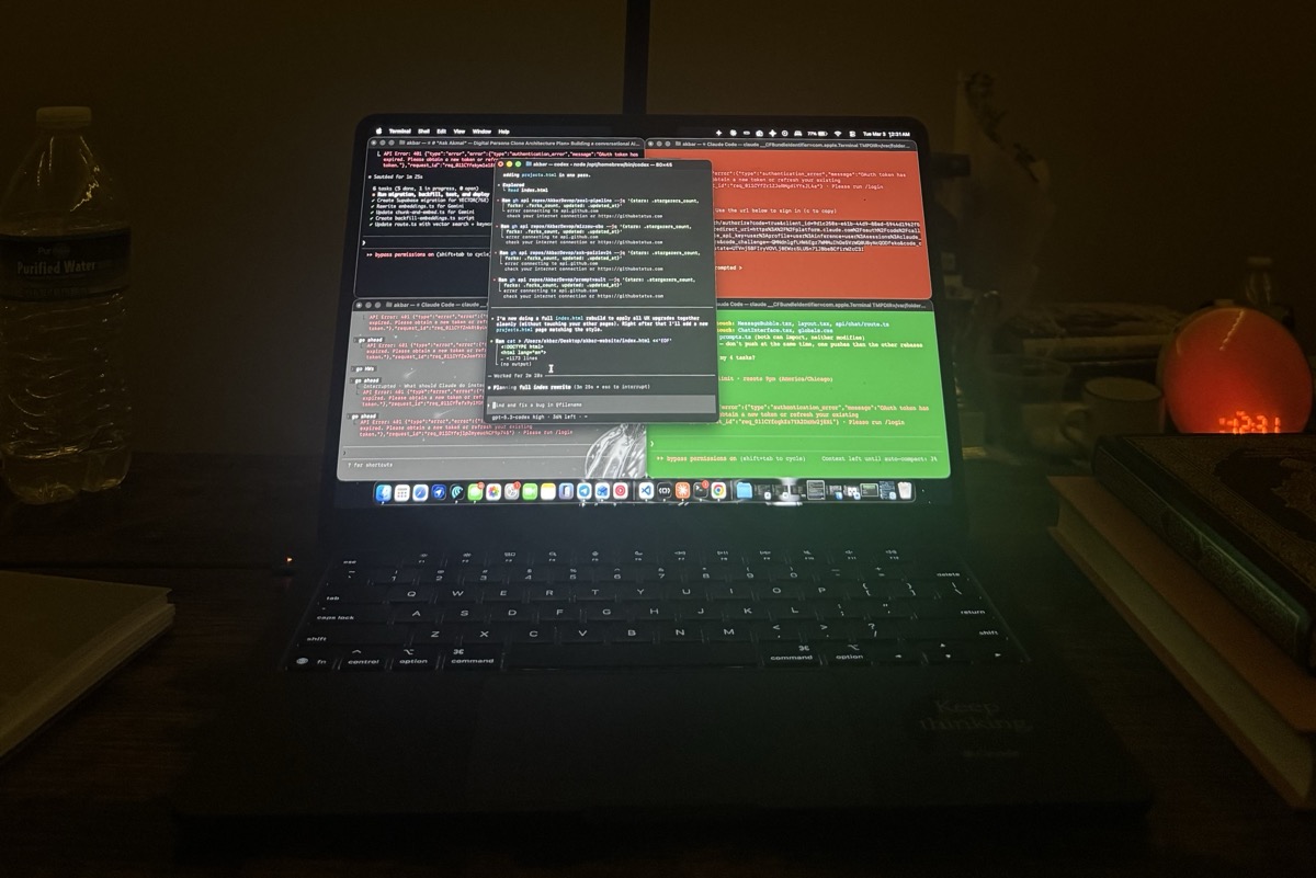 multiple Claude agents running simultaneously in terminal tabs on my Mac